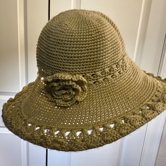 handmade-style crocheted sun hat with floral decoration